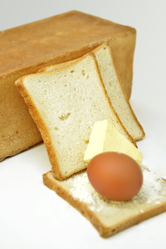 Sliced sandwich bread with a loaf